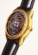 SKELETON-STYLE GOLD WATCH