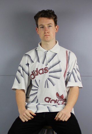 VINTAGE ADIDAS POLO SHIRT IN WHITE WITH ALL OVER PRINTED LOG