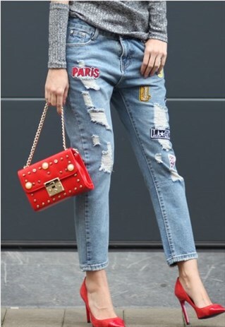 DISTRESSED DENIM JEANS WITH PATCHES