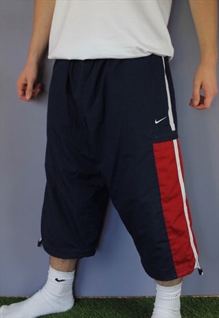 VINTAGE NIKE 3/4 LENGTH SHORTS IN NAVY WITH POCKETS, EMBROID