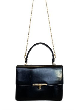 Vintage black Gucci bag with built-in chain