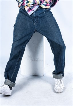 Vintage Levi's 511 Jeans in Blue Denim with Rips