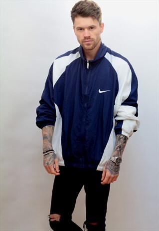 1990'S VINTAGE NIKE SHELL WINDBREAKER JACKET IN BLUE