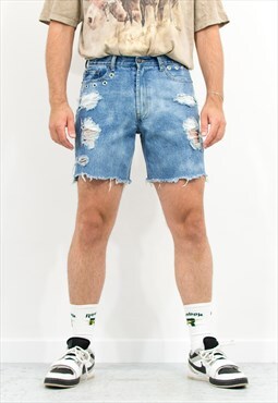Vintage reworked denim shorts patched distressed