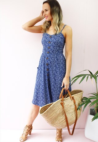 FLORAL PRINT SLEEVELESS FRONT POCKET SWING DRESS