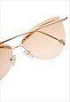 CAT-EYE SUNGLASSES IN GOLD WITH SOFT PINK LENS