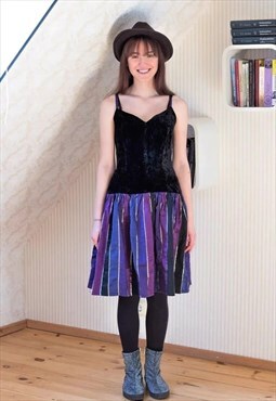 Black velour top and purple stripe skirt dress