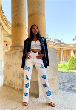 Vintage white jeans with butterflies in blue