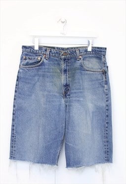 Vintage Levi's 550 jean shorts in blue. Best fits W35