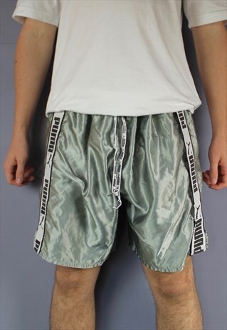VINTAGE PUMA SHORTS IN GREY WITH LOGO TAPING AND DRAWSTRINGS