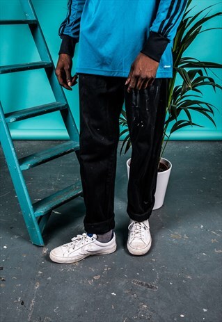 VINTAGE LEVI'S 501 JEANS IN BLACK WITH PAINT MARKS