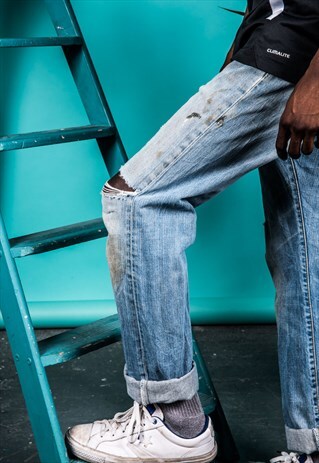 VINTAGE LEVI'S 501 JEANS IN BLUE WITH RIPS AND PAINT MARKS