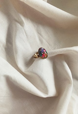 GOLD RING WITH SEE THROUGH STONE