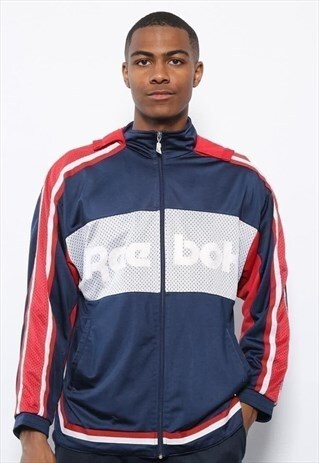 VINTAGE REEBOK SPELLOUT LOGO TRACK JACKET NAVY BLUE AND RED