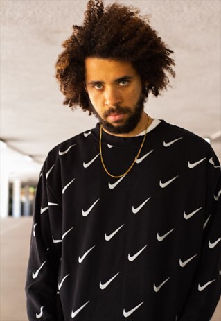 NIKE ALL OVER SWOOSH SWEATSHIRT IN BLACK AND WHITE