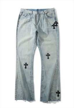 Trendy distressed cross pattern jeans