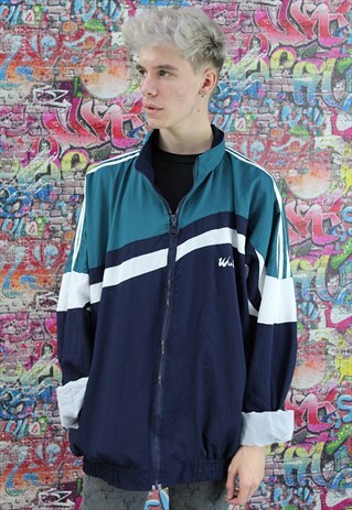 VINTAGE 90S SHELL JACKET / WINDBREAKER. UNISEX SPORTSWEAR.