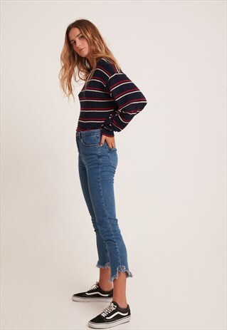 SUBDUED FRINGED CIGARETTE JEANS