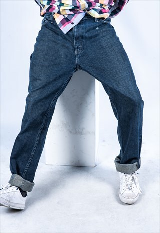 VINTAGE LEVI'S 511 JEANS IN BLUE DENIM WITH RIPS