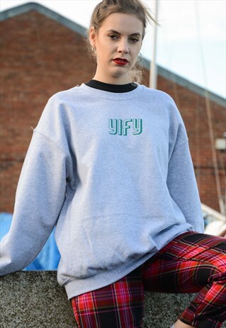 OVERSIZED SWEATSHIRT IN GREY WITH GRAPHIC LOGO.