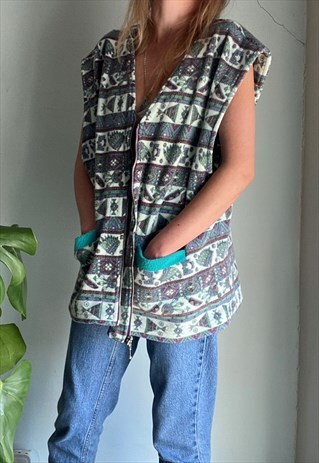 VINTAGE PATTERNED FLEECE ZIP UP WAISTCOAT.