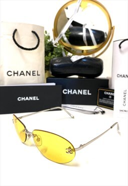 Chanel CC 4013 Rimless Yellow Tint sunglasses. 