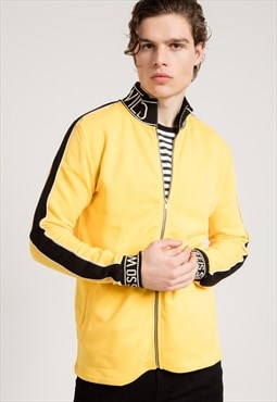 zipped jersey jacket in yellow with cuff and neck print