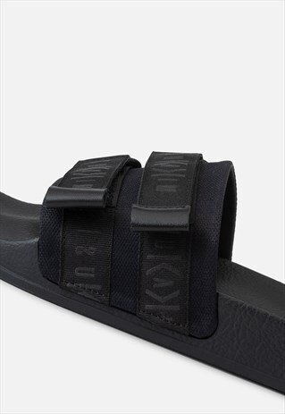 STRAPPED BLACK SLIDES WOMAN