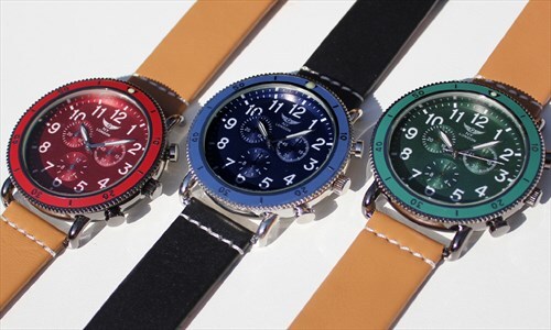 Dark red, blue and green explorer watches