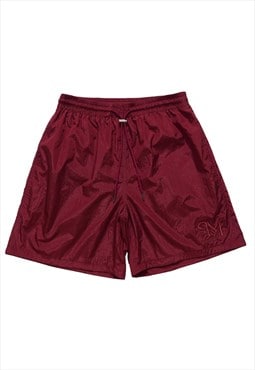 Shiny sport shorts in burgundy red