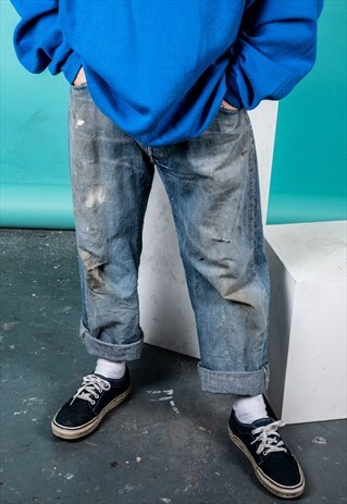 VINTAGE LEVI'S 501 JEANS IN BLUE DENIM WITH RIPS PAINT MARKS