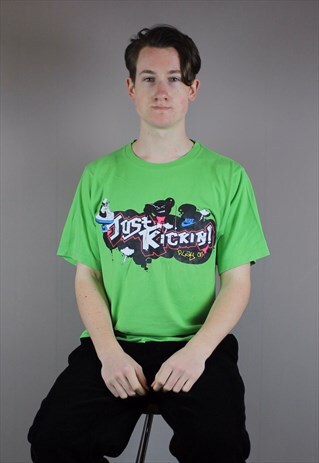 VINTAGE NIKE T-SHIRT IN GREEN WITH PRINTED SPELL OUT LOGO.