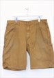 Vintage Carhartt carpenter shorts in tan. Best fits W37