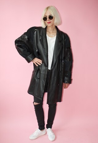 VINTAGE BLACK COAT WITH SHINY INSERTS.