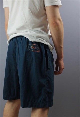 VINTAGE ADIDAS SHORTS IN NAVY WITH PRINTED LOGO, POCKETS,