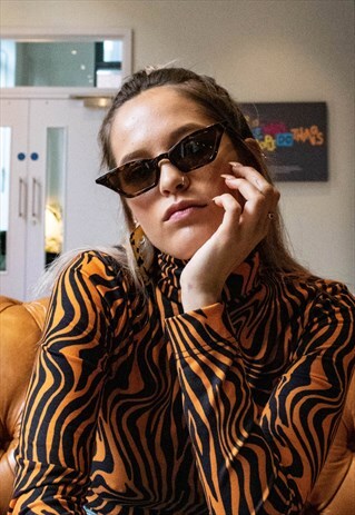 SLIM CAT EYE SUNGLASSES IN TORTOISE SHELL WITH TINTED LENSES
