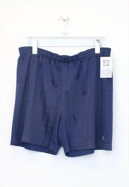 Vintage Umbro shorts in navy. Best fits L