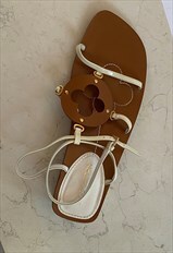 White and brown leather strappy sandals