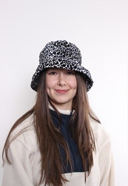 90s cow print bucket hat, vintage funky black and white 