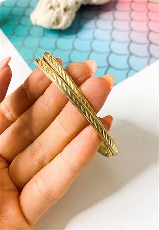 1970'S GOLD DOUBLE STRAND TORQUE BANGLE