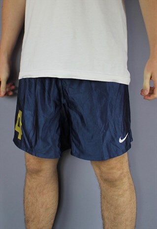 VINTAGE NIKE SHORTS IN NAVY WITH EMBROIDERED LOGO AND DRAWST