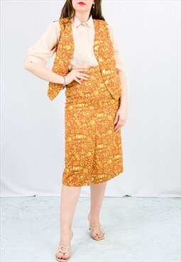 Vintage 70s two piece set in vest and skirt in orange