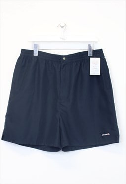 Vintage Ellesse shorts in navy. Best fits XL