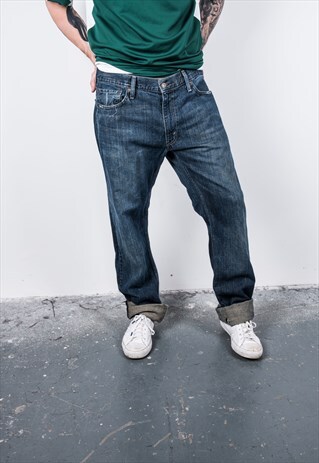 VINTAGE BLUE 514 LEVI'S RIPPED JEANS