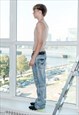 90'S VINTAGE SKATER FIT BAGGY PATCHED JEANS IN LIGHT WASH