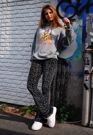 FLARED TROUSERS IN FLORAL PATTERN - BLACK