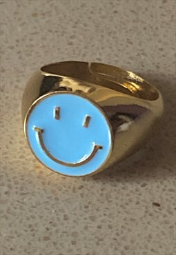 Pastel blue smiley face ring