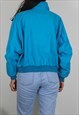 VINTAGE WOOLRICH BOMBER JACKET W LOGO HEM & FLEECE LINING