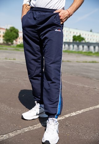VINTAGE ELLESSE UNISEX TRACKSUIT BOTTOMS IN NAVY BLUE