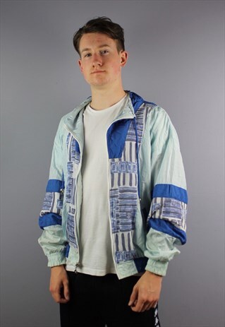 VINTAGE NYLON FESTIVAL WINDBREAKER IN BLUE WITH POCKETS. SIZ
